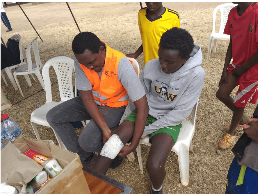 Health workers providing education to community members
